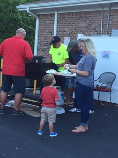 Guests of all ages making s'mores at the VFW Calabash Post #7288 Independence Day Celebration, July 4th, 2018.